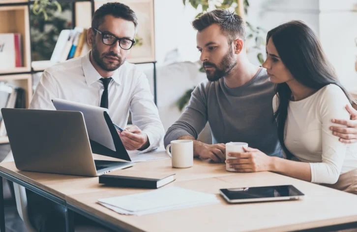 mortgage adviser with clients